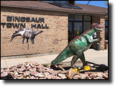 Picture of Trex in front of Dinosaur Town Hall